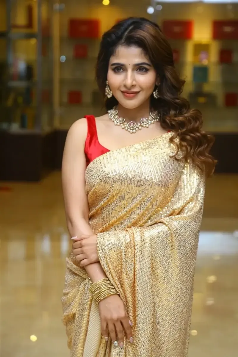 Iswarya Menon in Gold color Saree at Spy Movie Release Event